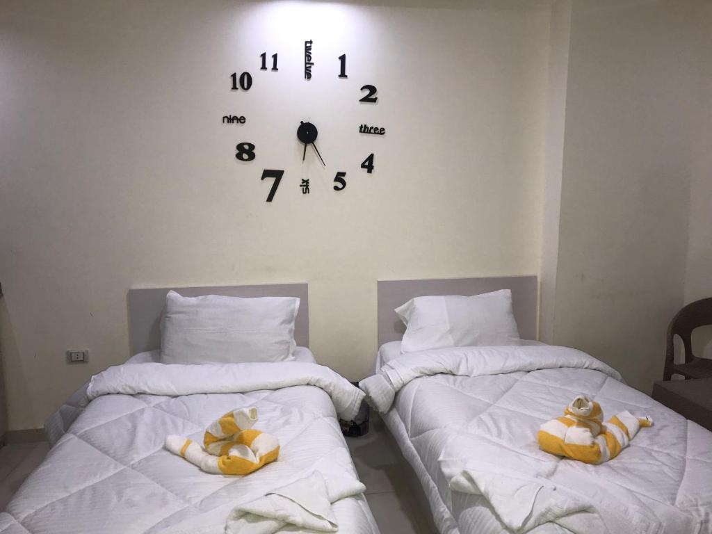 Postel nebo postele na pokoji v ubytování Casablanca beach