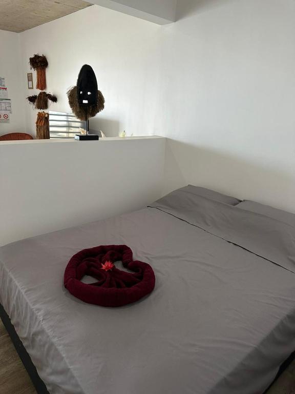 Postel nebo postele na pokoji v ubytování Pension Irivai, Appartement RAVA 1 chambre bord de mer