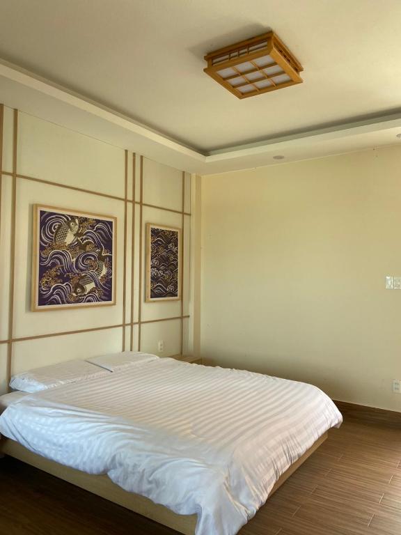 Giường trong phòng chung tại AN PHÚ Home
