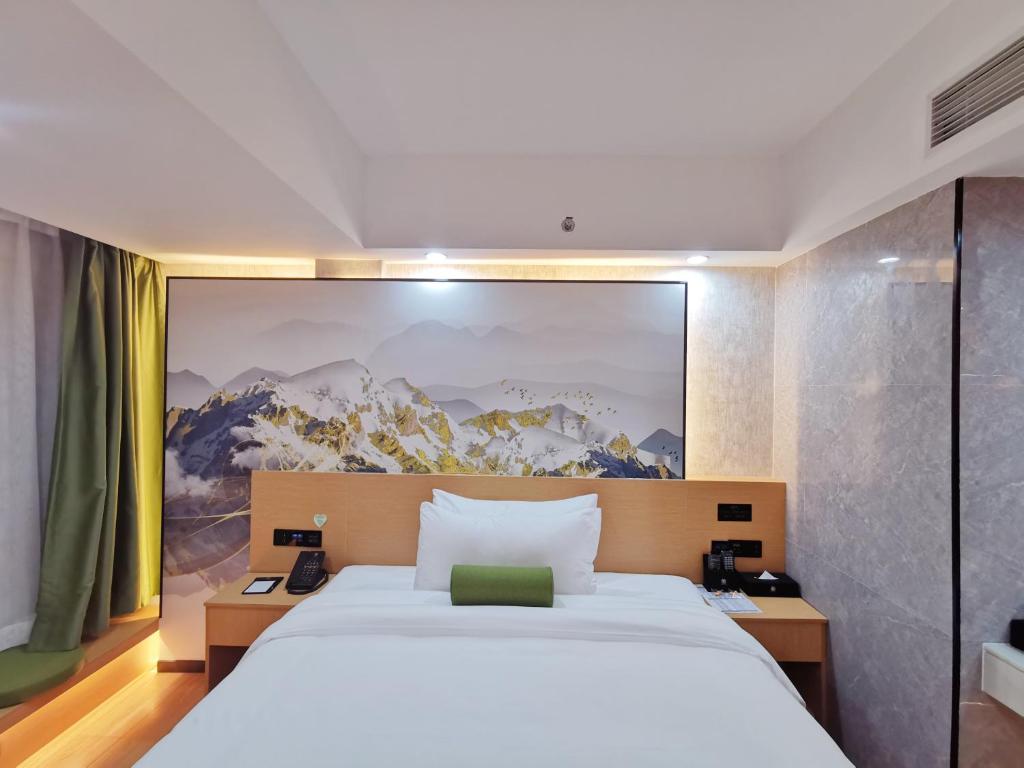 Postel nebo postele na pokoji v ubytování Connar Hotel - Shenzhen Futian