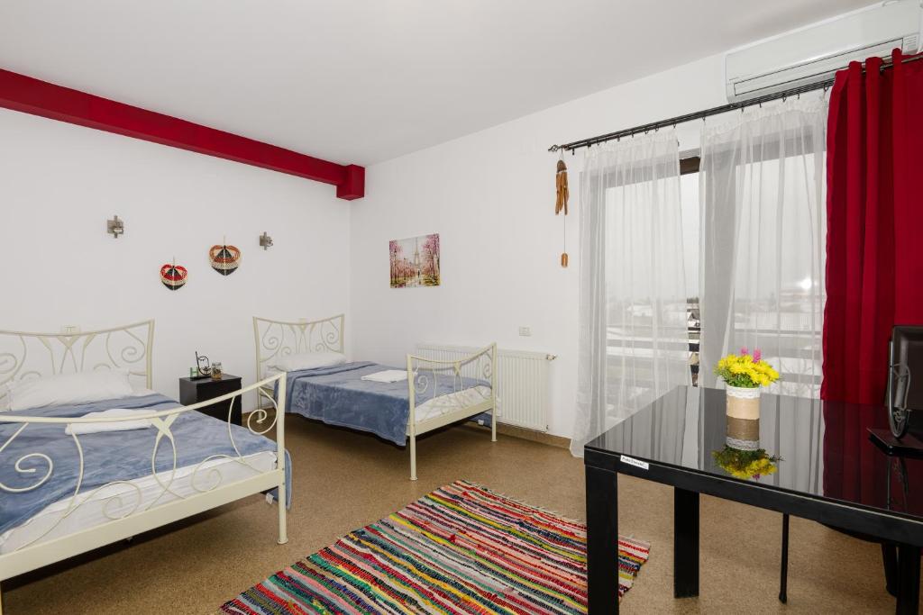 Postel nebo postele na pokoji v ubytování Hotel ENZO