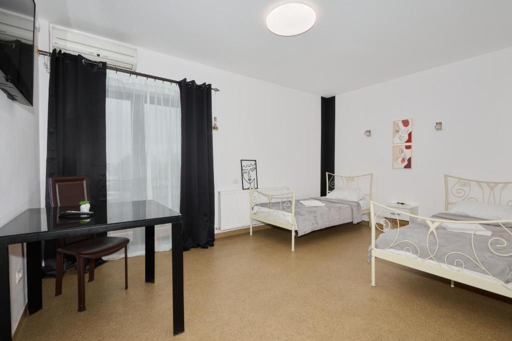Postel nebo postele na pokoji v ubytování Hotel ENZO
