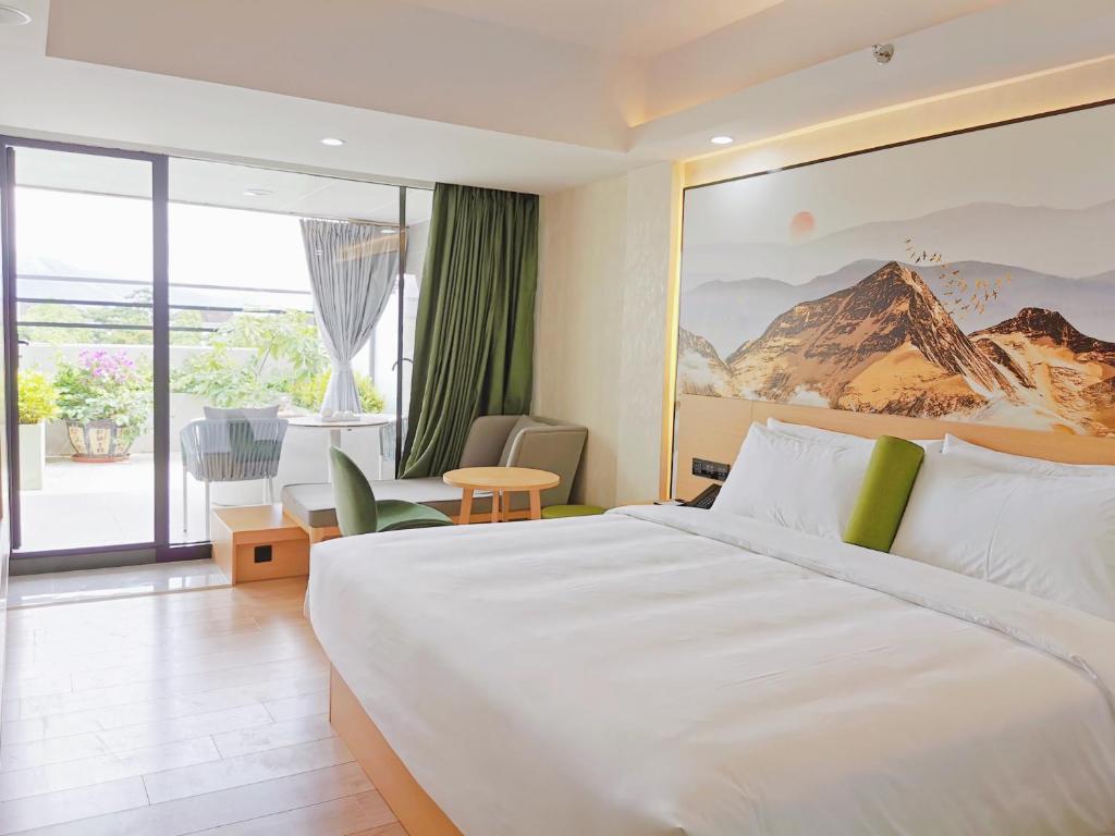Postel nebo postele na pokoji v ubytování Connar Hotel - Shenzhen Futian
