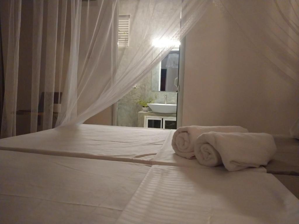 Postel nebo postele na pokoji v ubytování Hello Whites