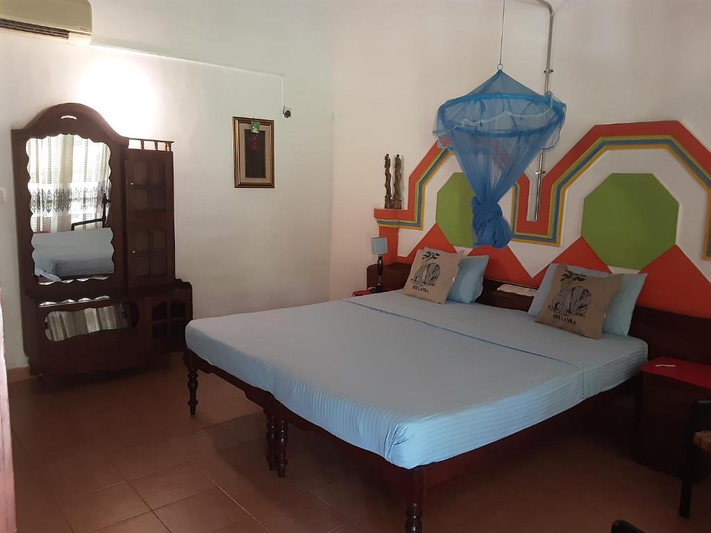 Postel nebo postele na pokoji v ubytování Pahalage Guesthouse