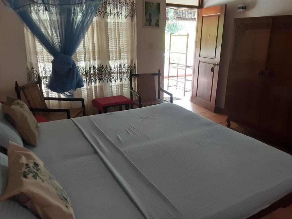 Postel nebo postele na pokoji v ubytování Pahalage Guesthouse