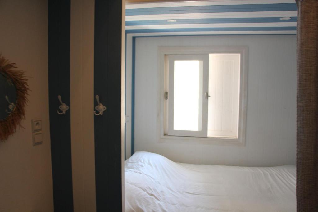 Postel nebo postele na pokoji v ubytování Hostel La Smala