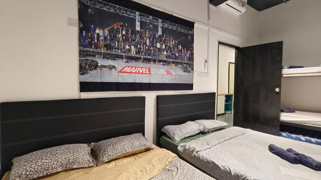 Postel nebo postele na pokoji v ubytování Warisan Homestay 18pax Kota Kinabalu