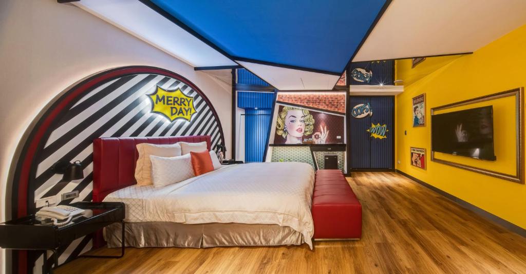 Postel nebo postele na pokoji v ubytování Merry Day Motel Zhonghe Branch