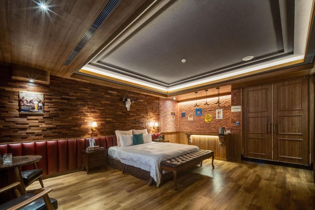 Postel nebo postele na pokoji v ubytování Merry Day Motel Zhonghe Branch