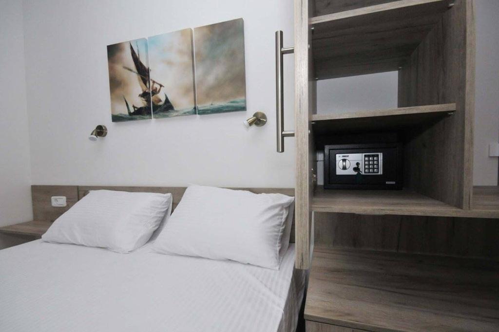 Postel nebo postele na pokoji v ubytování Apartments A Čanj