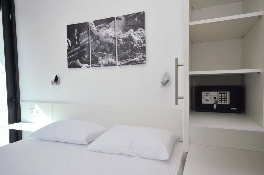 Postel nebo postele na pokoji v ubytování Apartments A Čanj