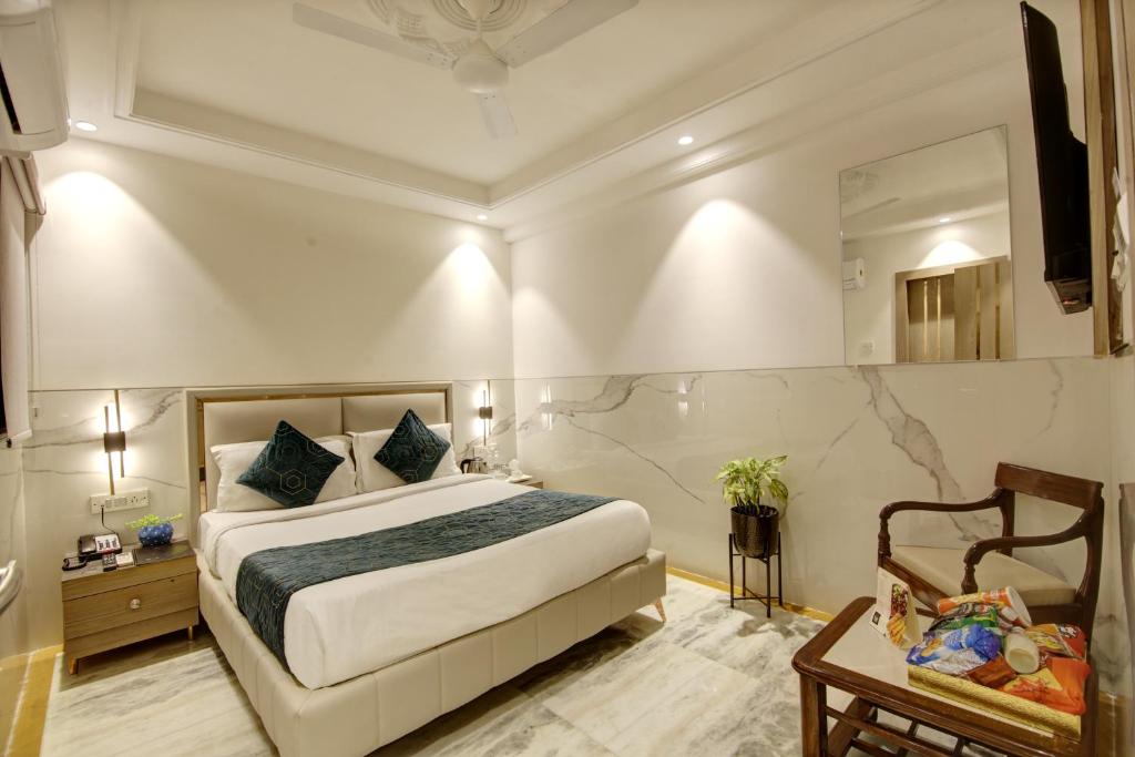 Postel nebo postele na pokoji v ubytování Hotel International Inn - Near Delhi Airport