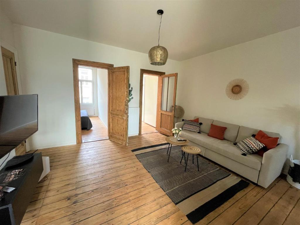 TV a/nebo společenská místnost v ubytování Boho Apartments - 2 Bedrooms