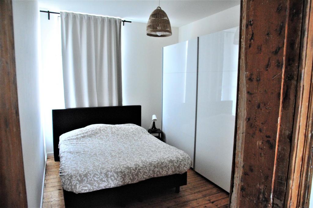 Postel nebo postele na pokoji v ubytování Boho Apartments - 2 Bedrooms