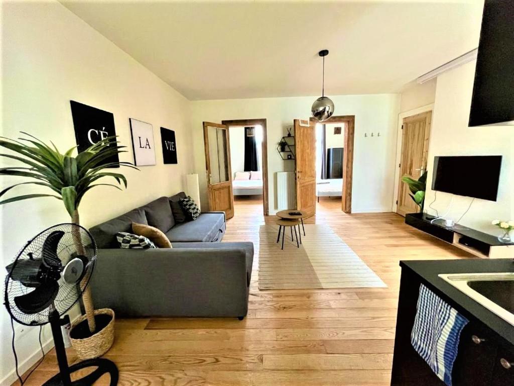 TV a/nebo společenská místnost v ubytování Boho Apartments - 2 Bedrooms