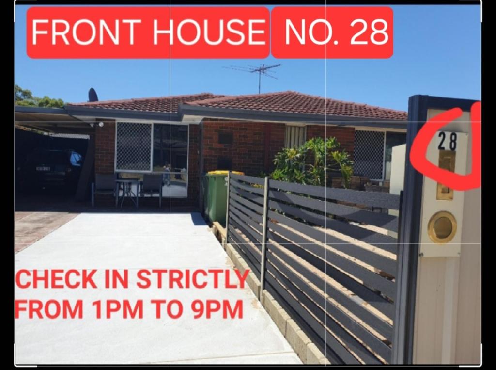 a front house with a sign that reads front house check in strictly from at Airport budget room in Perth