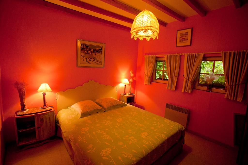 Postel nebo postele na pokoji v ubytování La Gran'Porte