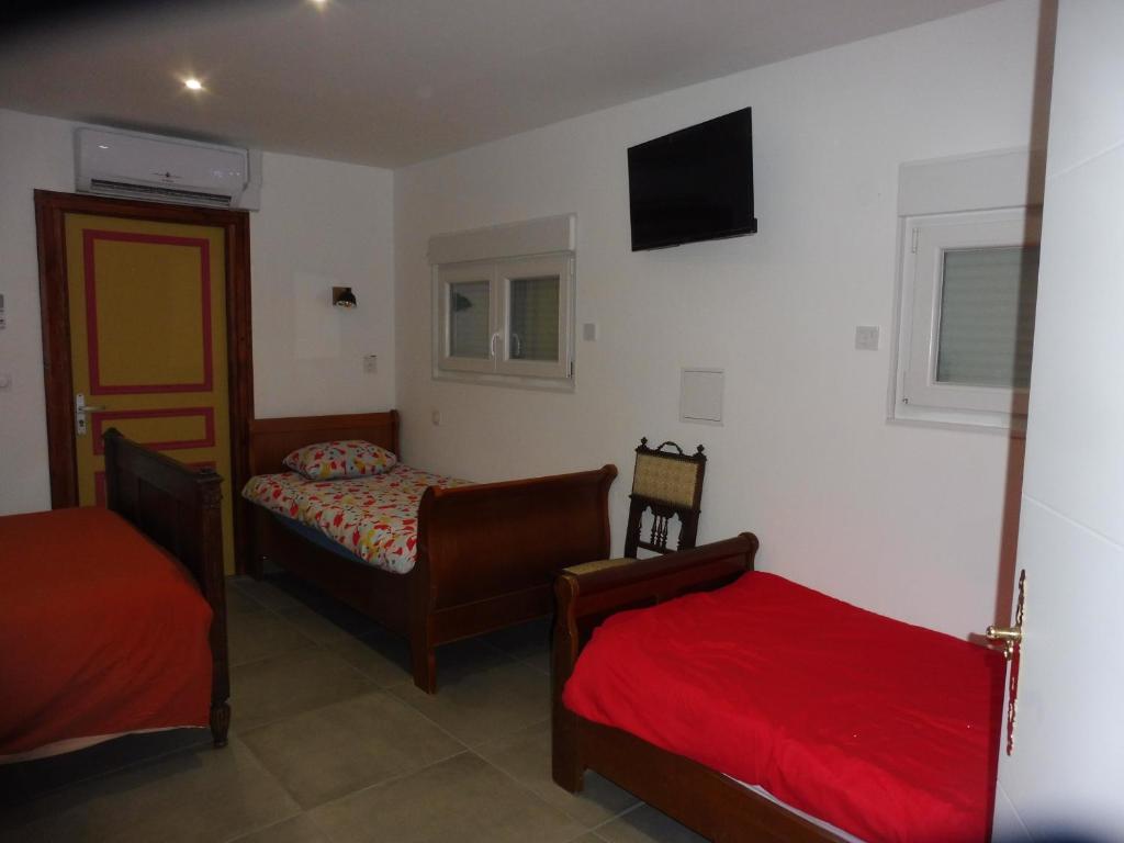 Postel nebo postele na pokoji v ubytování 4 Chambres meublées et un seul studio avec petite cuisine