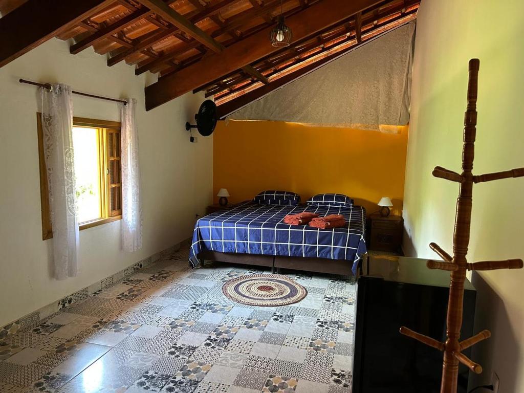 Postel nebo postele na pokoji v ubytování Rancho Potala