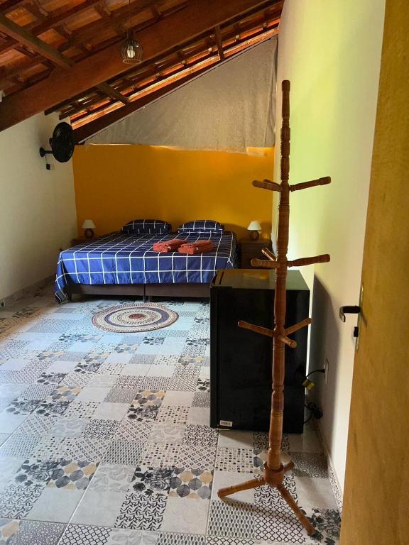 Postel nebo postele na pokoji v ubytování Rancho Potala