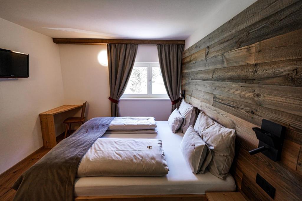 Postel nebo postele na pokoji v ubytování Garni Bergblick