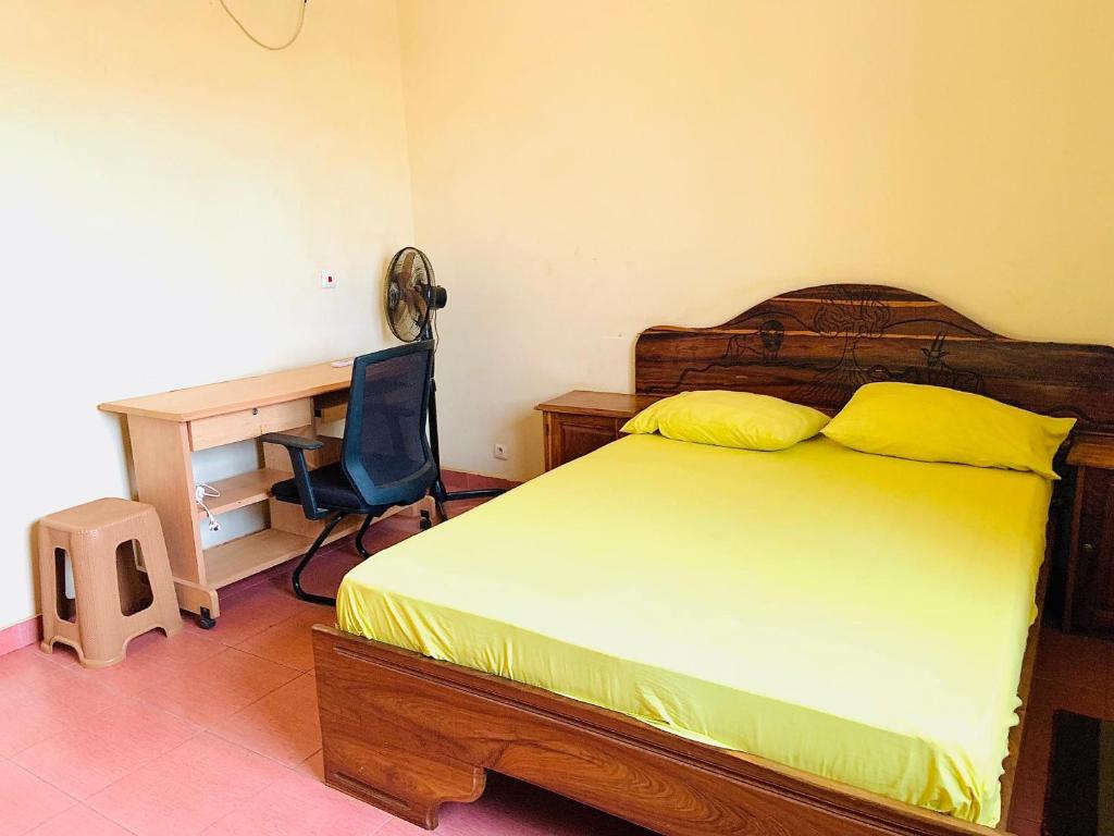 En eller flere senge i et værelse på Teranga Niokolo