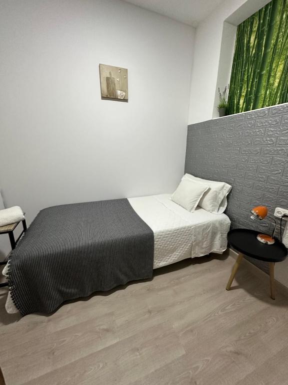 Postel nebo postele na pokoji v ubytování Apartamento Kalea corazón urbano