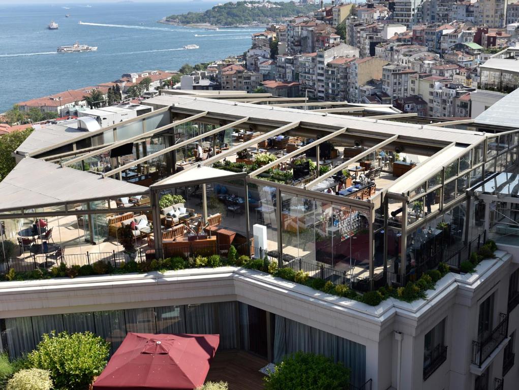 an aerial view of a building with a restaurant at CVK Park Bosphorus Hotel Istanbul in Istanbul