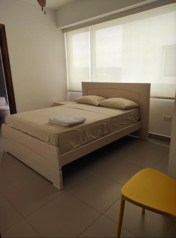Postel nebo postele na pokoji v ubytování Resort Playa Azul Departamentos