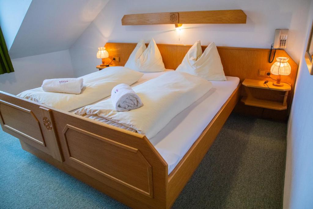 Postel nebo postele na pokoji v ubytování Landhotel Haagerhof