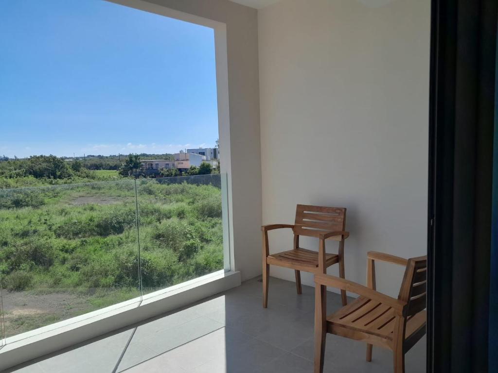 Balkón nebo terasa v ubytování Paille en Queue apartment