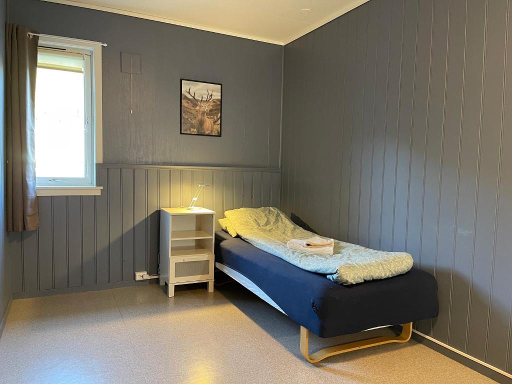 Postel nebo postele na pokoji v ubytování Leirvik i Sogn-Apartment