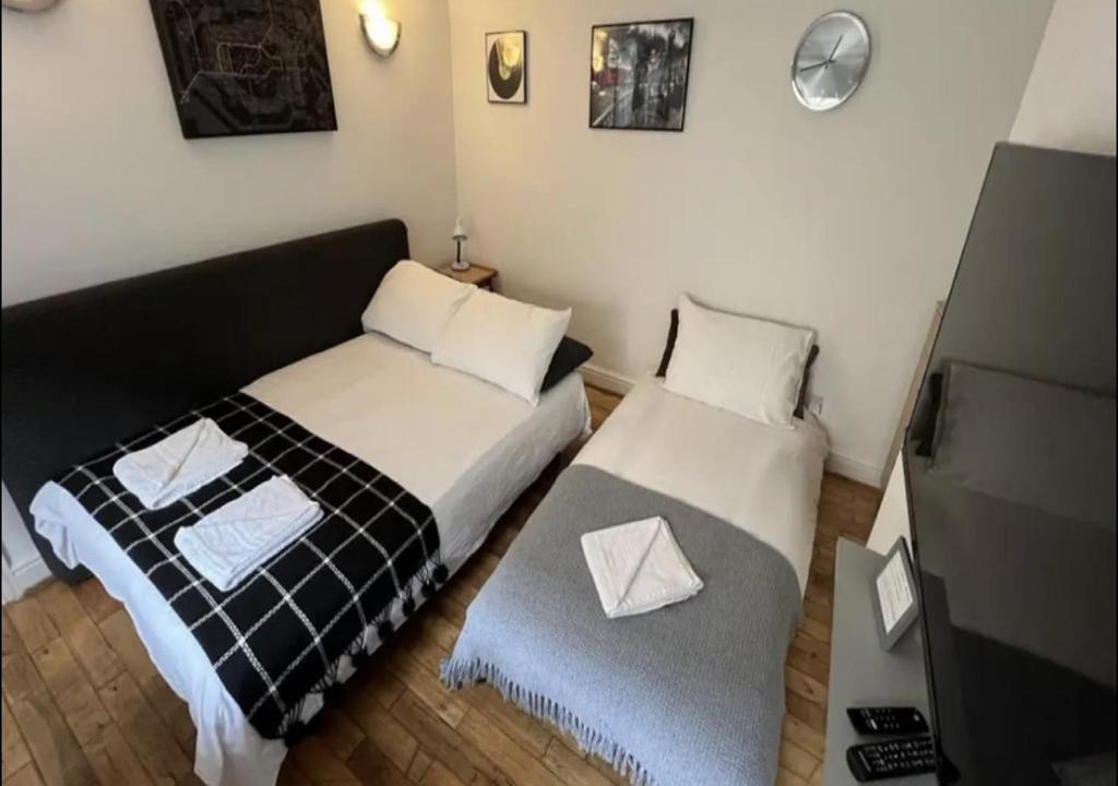 Postel nebo postele na pokoji v ubytování Special Flat in Camden Town