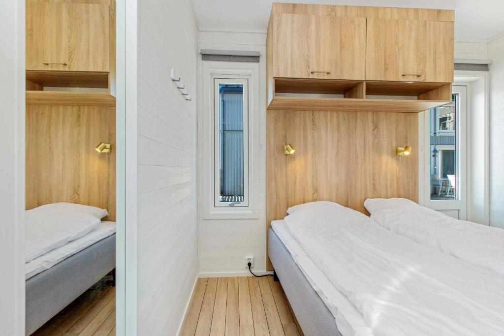 Postel nebo postele na pokoji v ubytování Kosterbaden