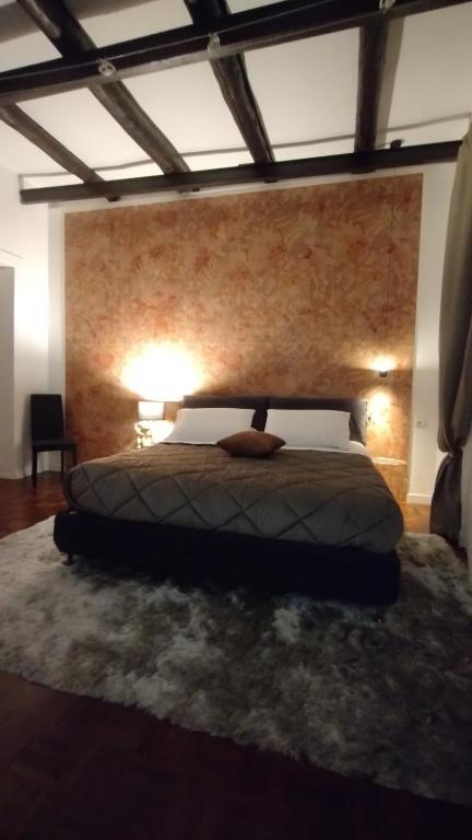 Postel nebo postele na pokoji v ubytování Plebiscito Suite Apartment