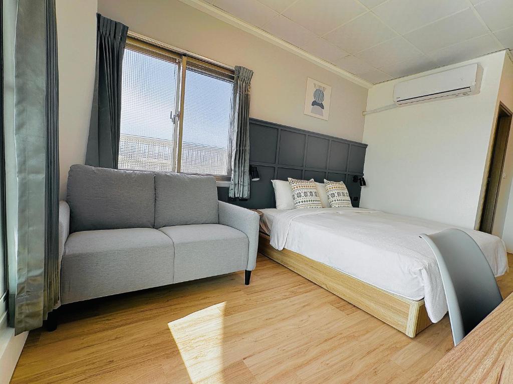 Postel nebo postele na pokoji v ubytování Qing Taoyuan Homestay