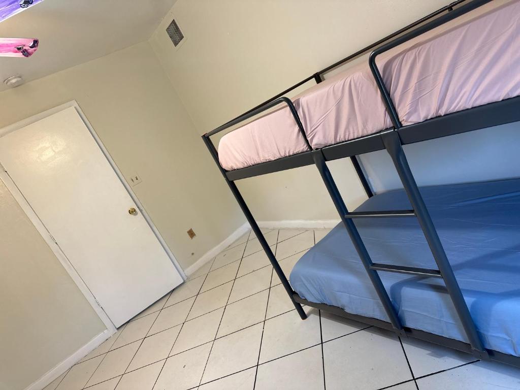 Postel nebo postele na pokoji v ubytování Hospedaje North Miami