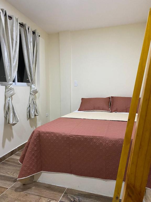 Postel nebo postele na pokoji v ubytování Hostal Don Jose