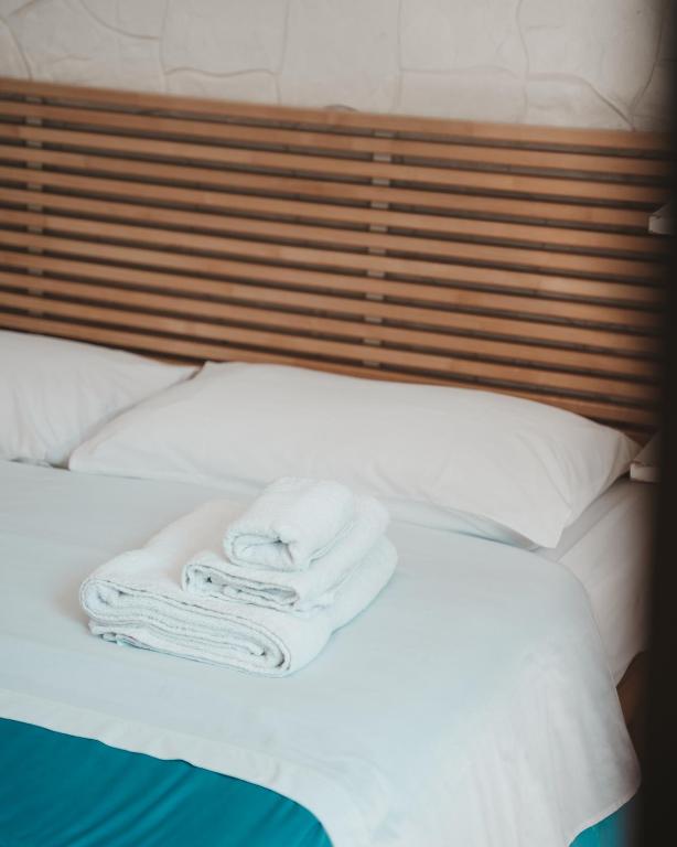 Posteľ alebo postele v izbe v ubytovaní Dimora Mariù - Casa Vacanze