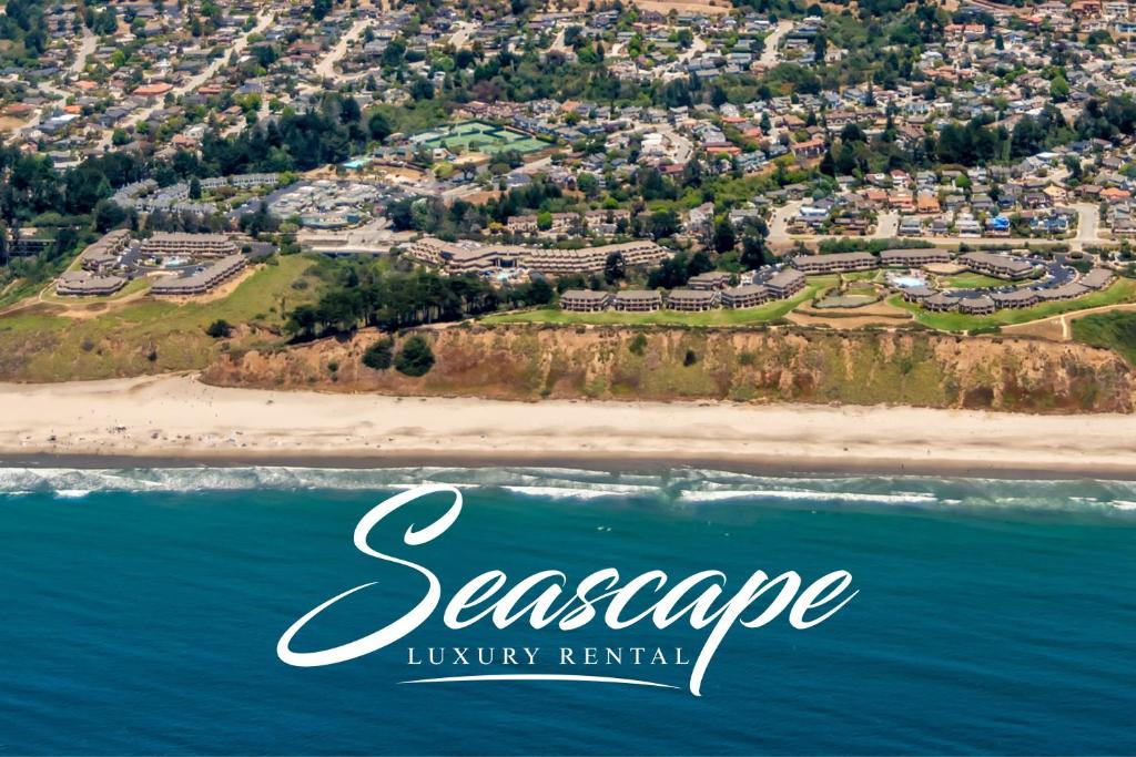 an aerial view of a beach with houses at Luxury Villa - Flora View - Ground Level -Seascape in Aptos