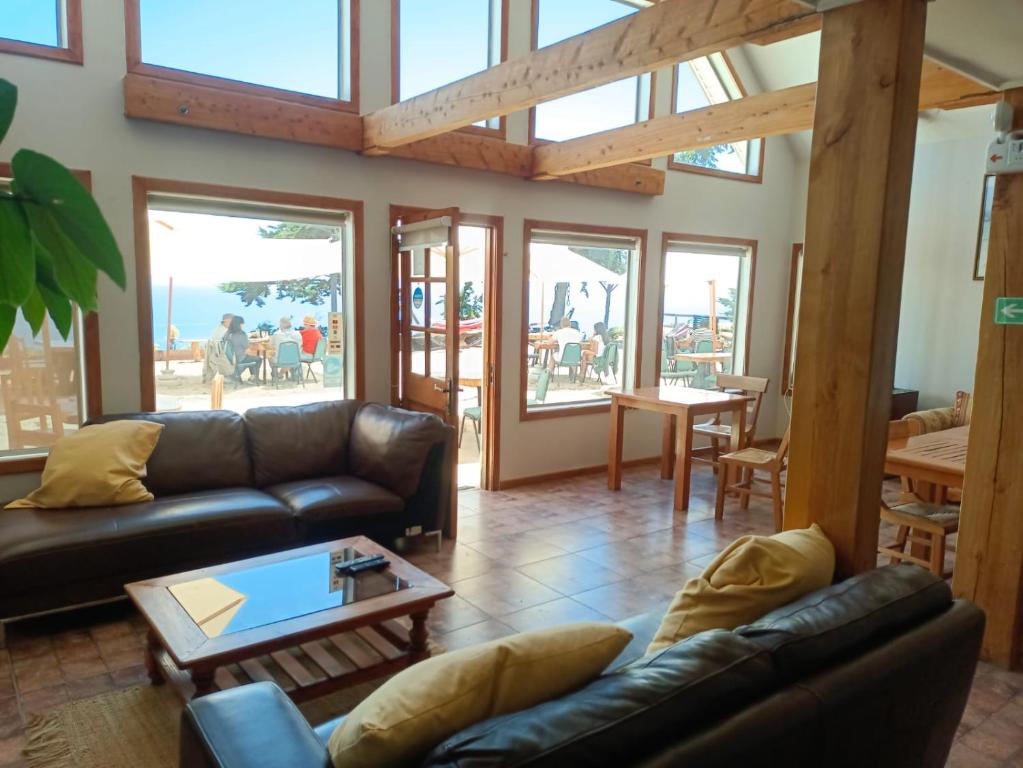 Posezení v ubytování Hostal Quiriyuca Sur