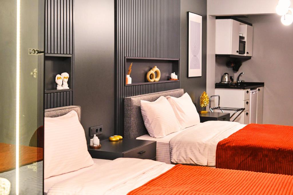TAKS-INN Suites - Comfort Quadruple Room