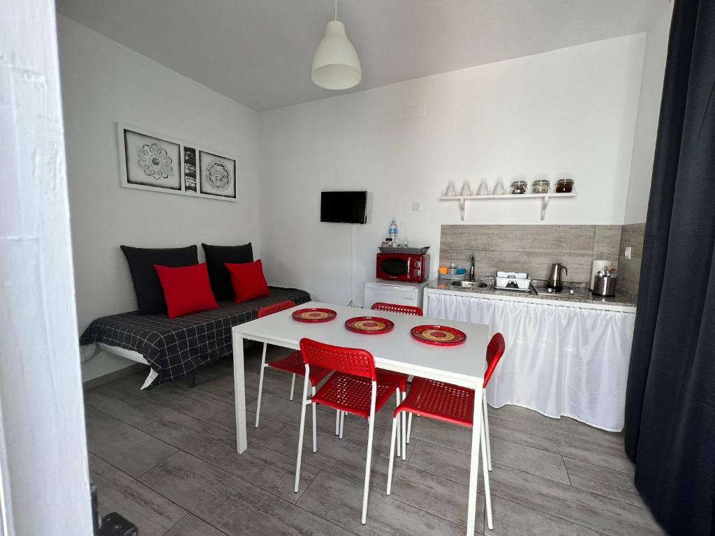 Televízia a/alebo spoločenská miestnosť v ubytovaní Casa Patio Paraíso