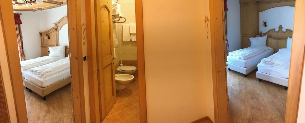 Postel nebo postele na pokoji v ubytování Hotel Malder