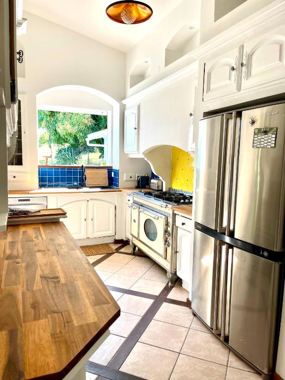 Kuchyň nebo kuchyňský kout v ubytování Maison La Samana