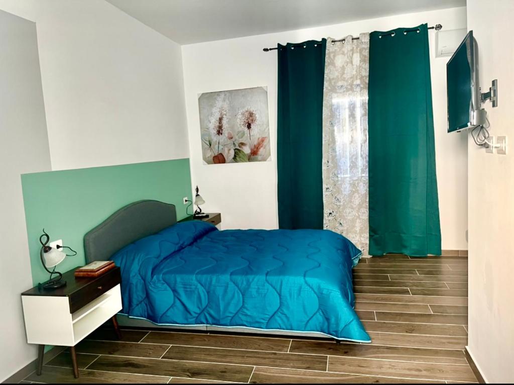 Postel nebo postele na pokoji v ubytování B&B ILSE