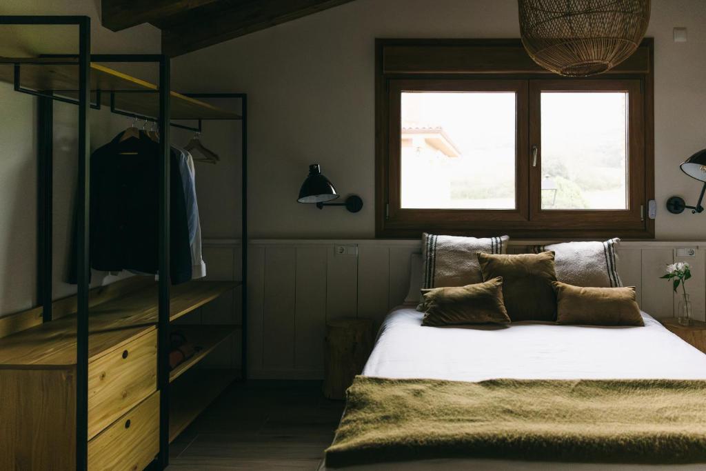 Postel nebo postele na pokoji v ubytování Casa Gildda
