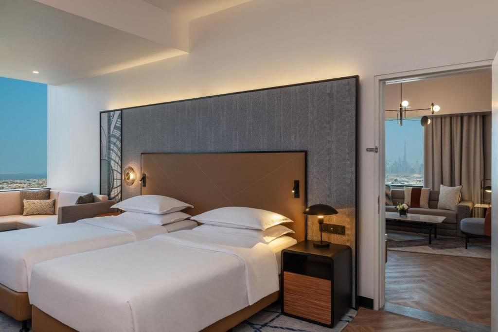 Voodi või voodid majutusasutuse Sheraton Mall of the Emirates Hotel, Dubai toas