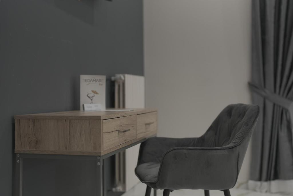Posezení v ubytování REDAMARE SUITE